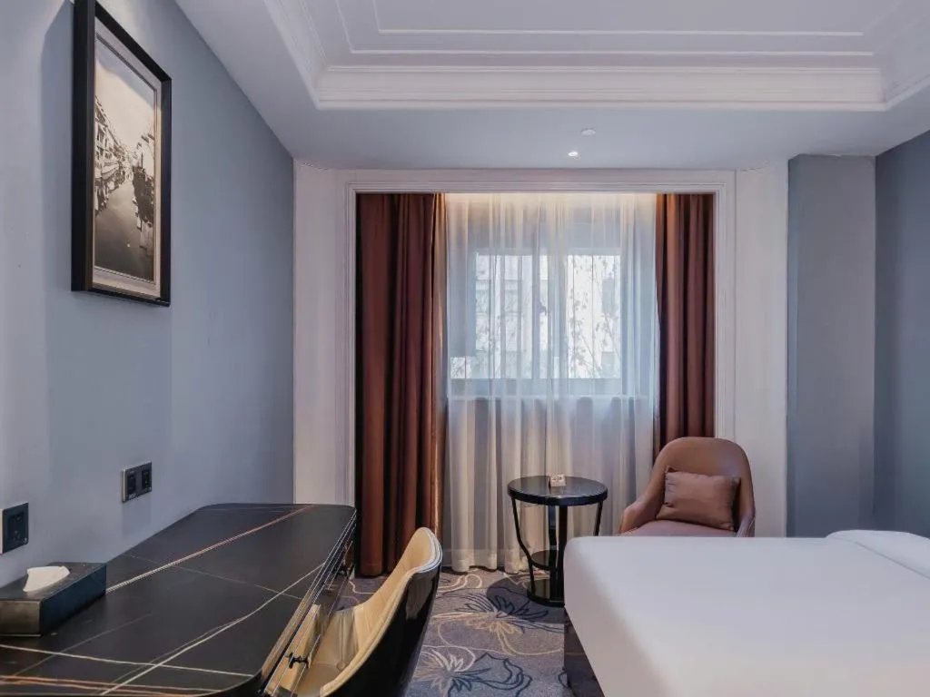 Bed in Jinjiang Metropolo Hotel Nanjing Confucius Temple Branch