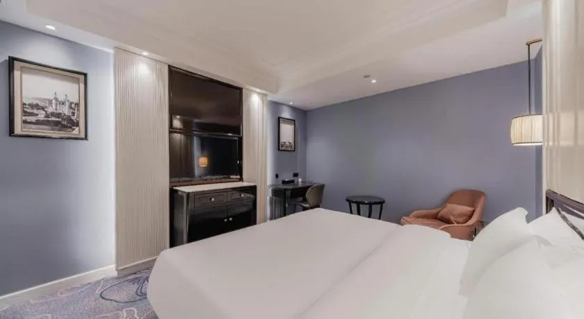 Bed in Jinjiang Metropolo Hotel Nanjing Confucius Temple Branch