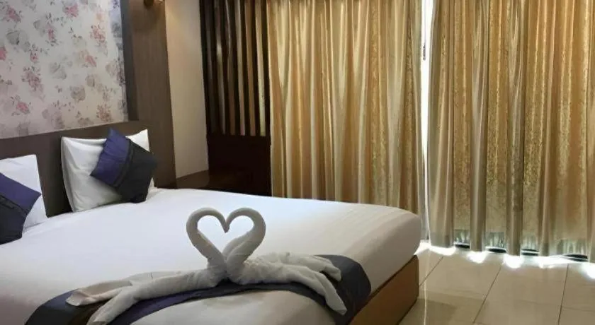 Bed in Phitsanulok Orchid Hotel