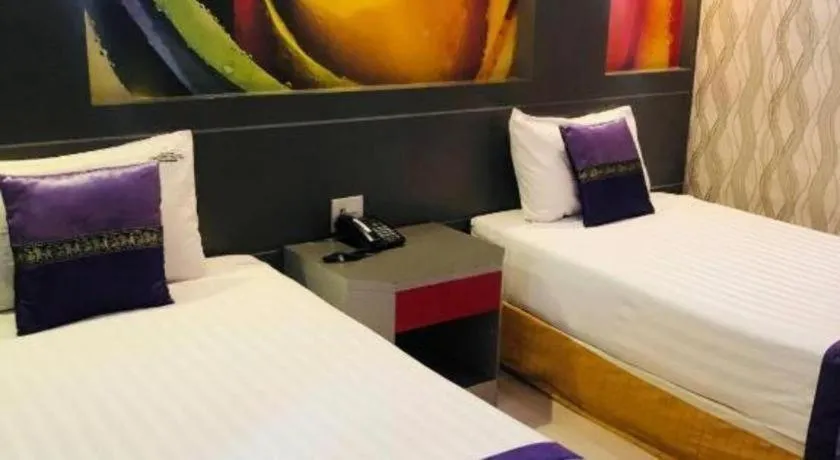 Bed in Phitsanulok Orchid Hotel