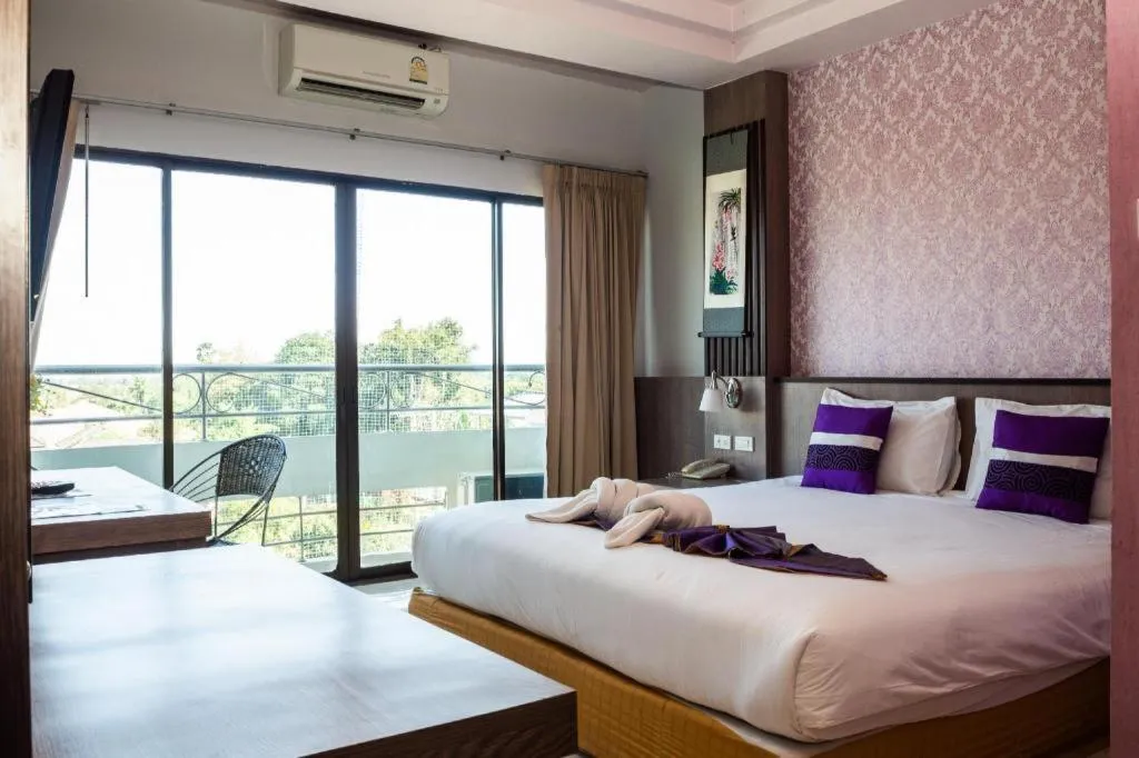 Bed in Phitsanulok Orchid Hotel