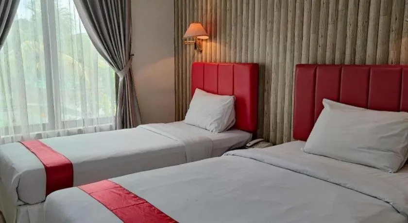 Bed in Queen City Hotel