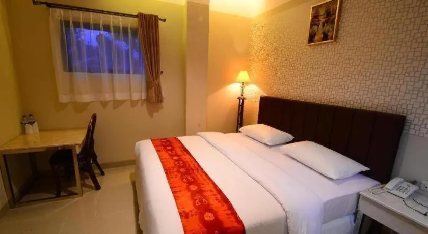 Bed in Queen City Hotel