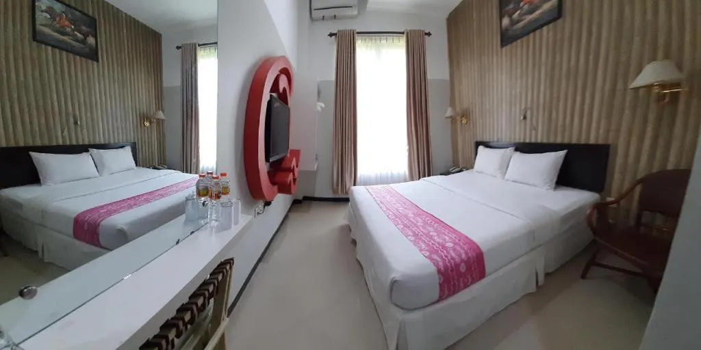 Bed in Queen City Hotel