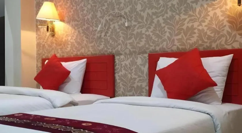 Bed in Queen City Hotel