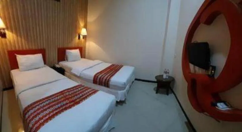 Bed in Queen City Hotel