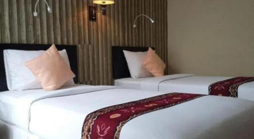 Bed in Queen City Hotel