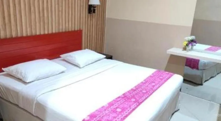 Bed in Queen City Hotel