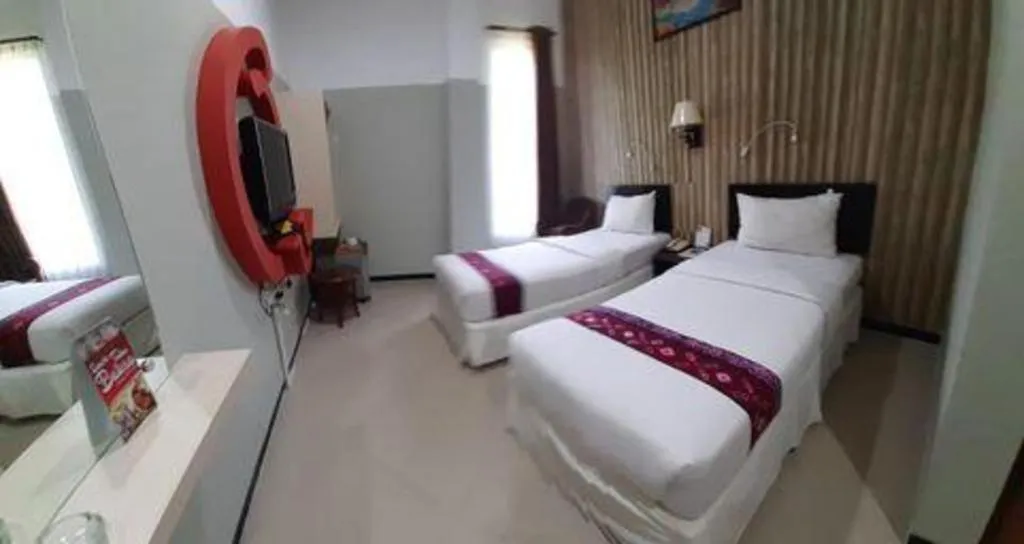 Bed in Queen City Hotel