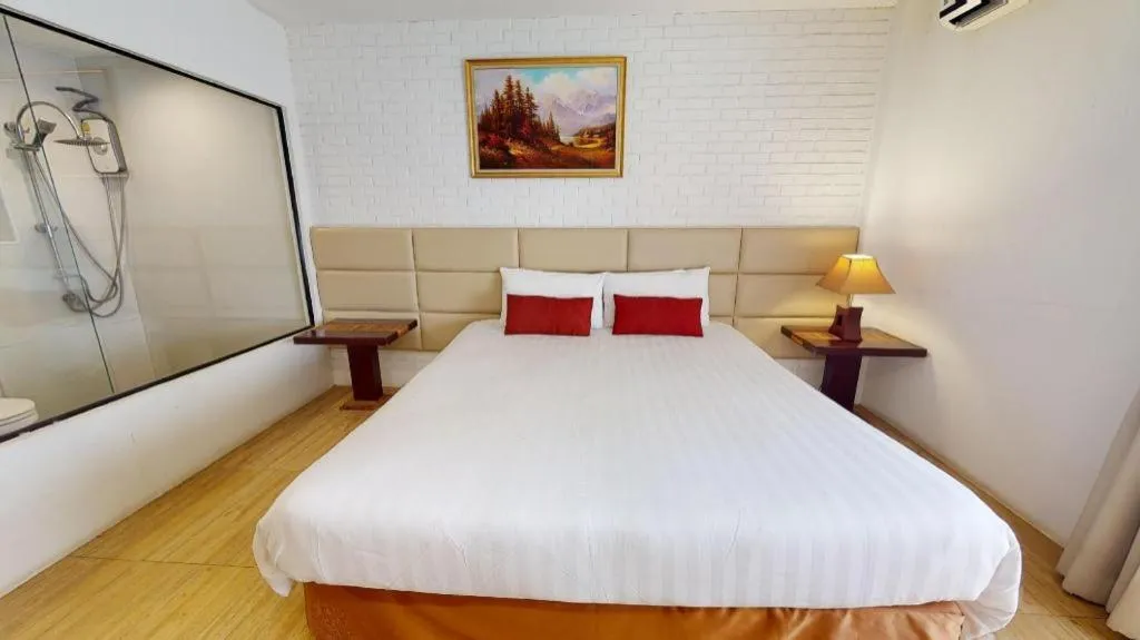 Bed in De Aerng Boutique Hotel