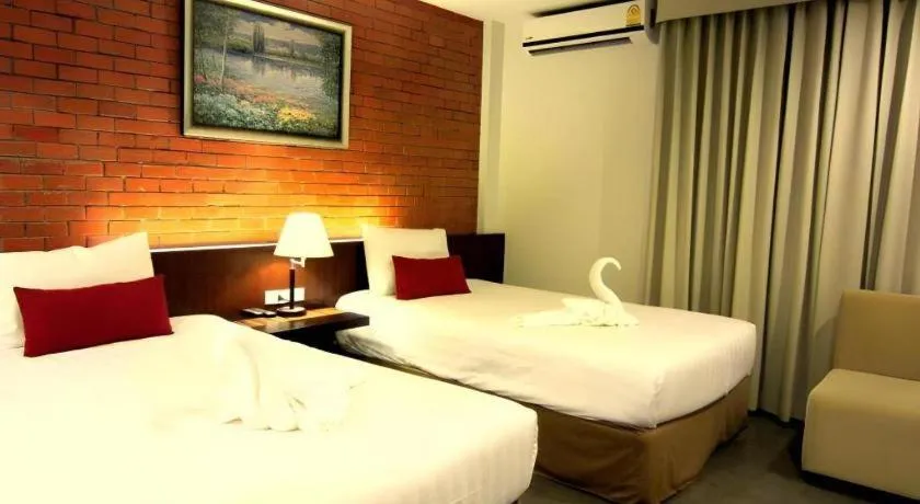 Bed in De Aerng Boutique Hotel