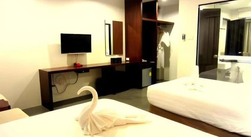 Bed in De Aerng Boutique Hotel