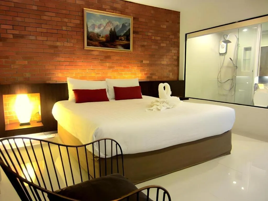 Bed in De Aerng Boutique Hotel