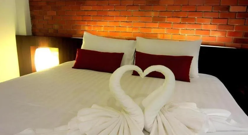 Bed in De Aerng Boutique Hotel