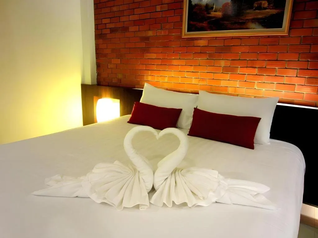 Bed in De Aerng Boutique Hotel
