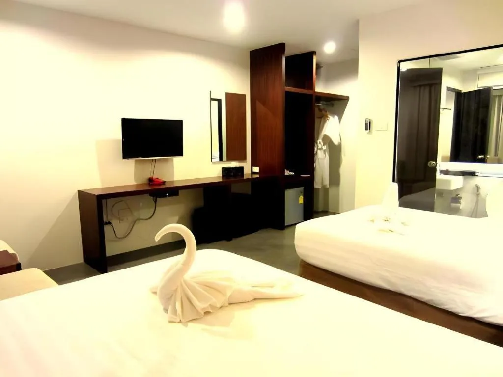 Bed in De Aerng Boutique Hotel