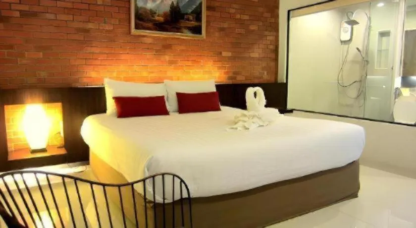 Bed in De Aerng Boutique Hotel