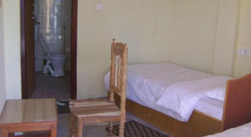 Bed in Mystique Highland Resort