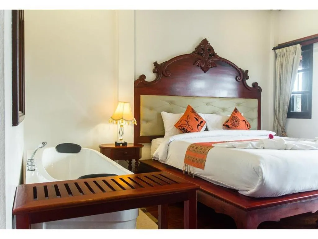 Bed in The View Pavilion Hotel