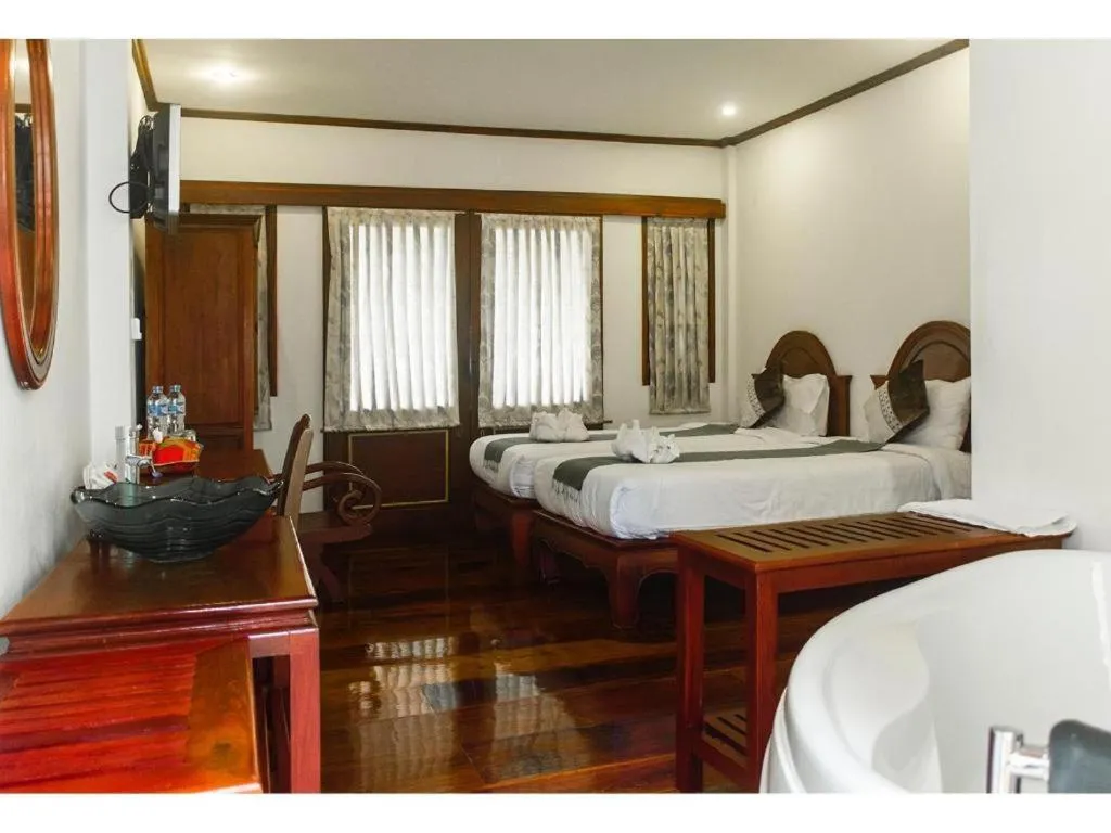 Bed in The View Pavilion Hotel