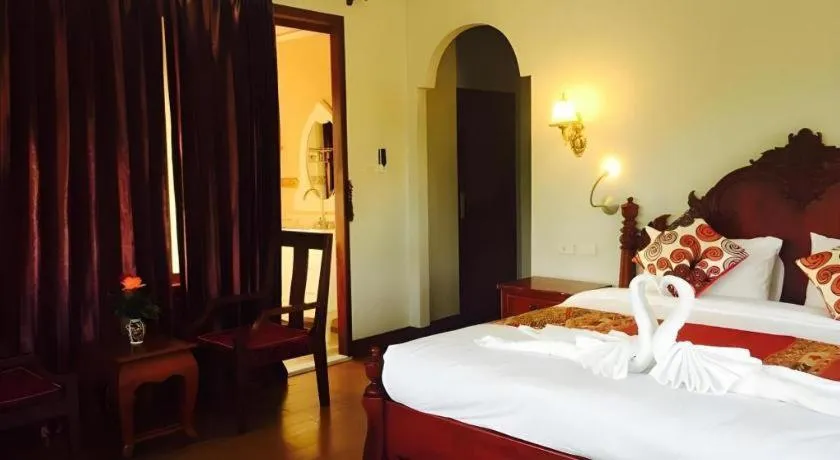 Bed in The View Pavilion Hotel