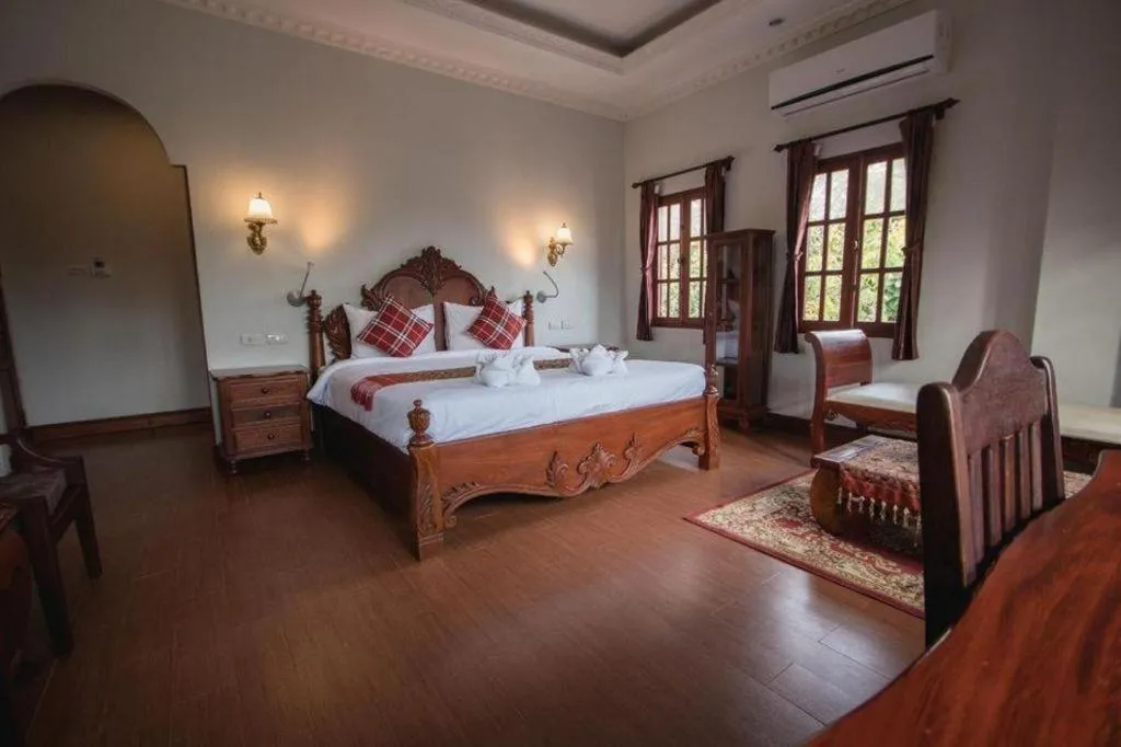 Bed in The View Pavilion Hotel