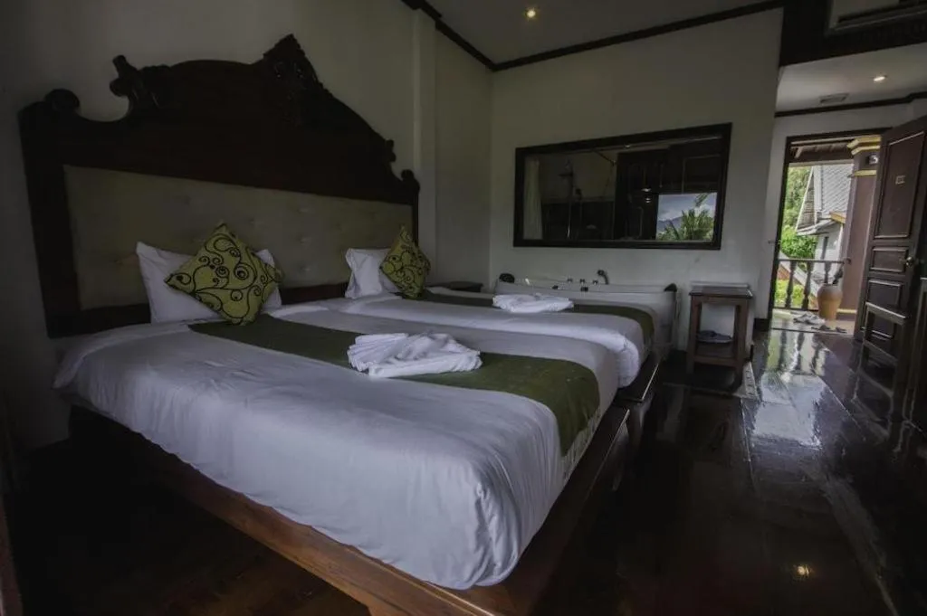 Bed in The View Pavilion Hotel