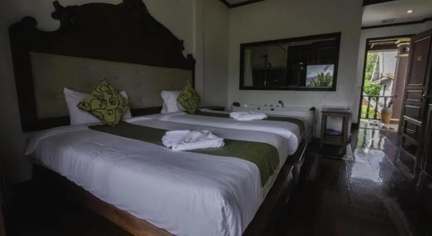 Bed in The View Pavilion Hotel