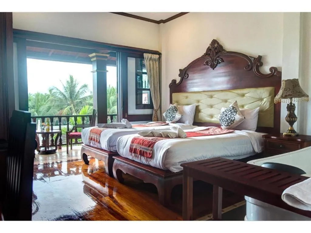 Bed in The View Pavilion Hotel