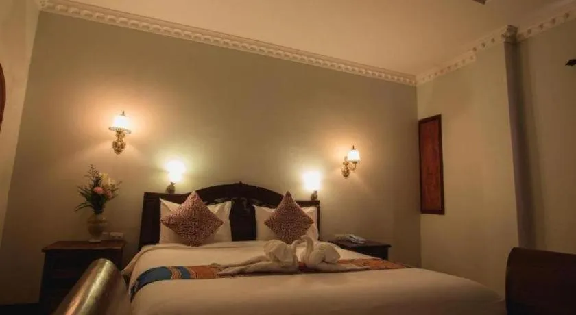 Bed in The View Pavilion Hotel