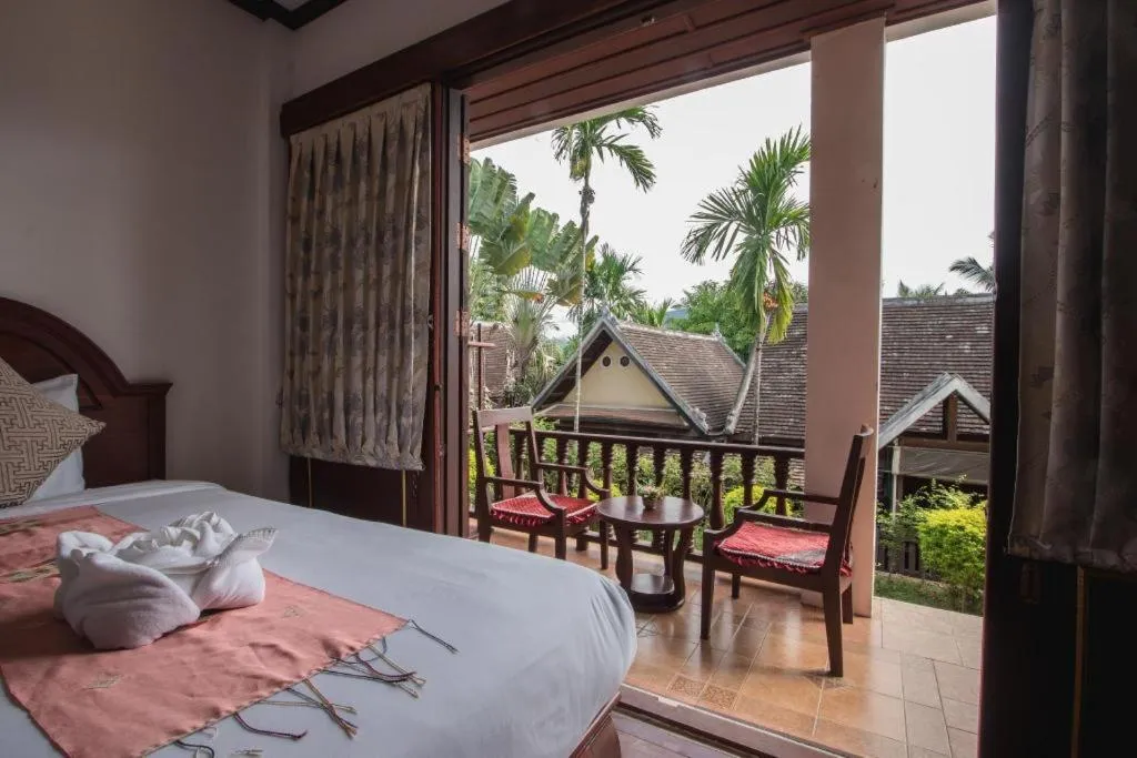 Bed in The View Pavilion Hotel