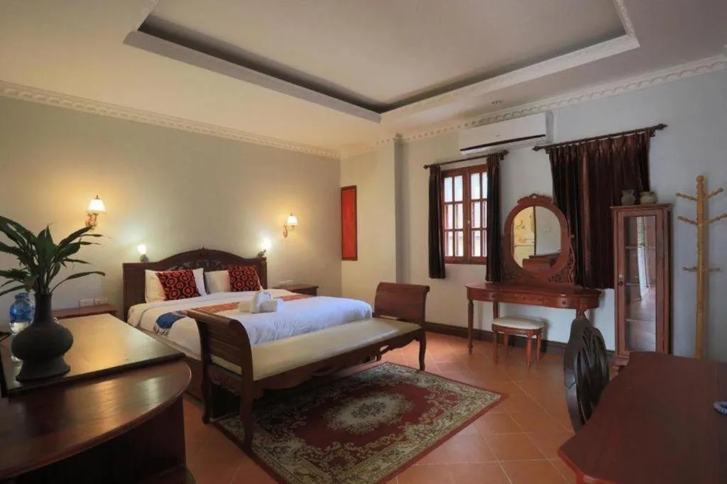 Bed in The View Pavilion Hotel