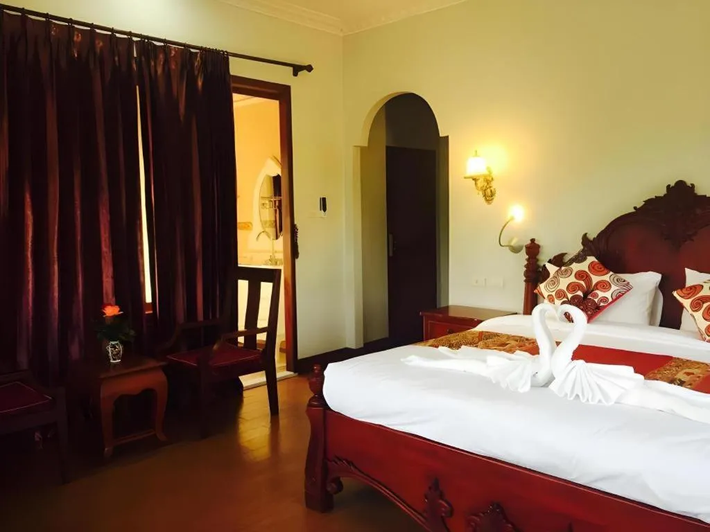 Bed in The View Pavilion Hotel