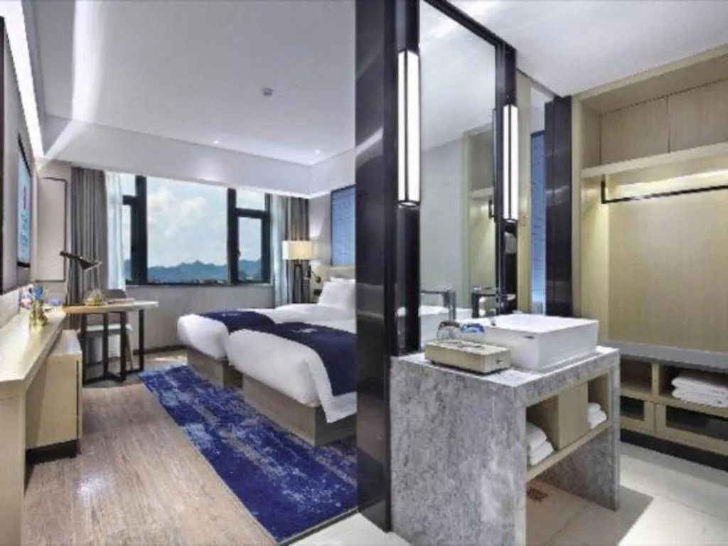 Bed in Echarm Hotel Guilin North High Speed Railway Station