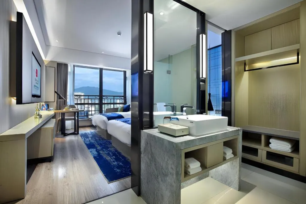 Bed in Echarm Hotel Guilin North High Speed Railway Station