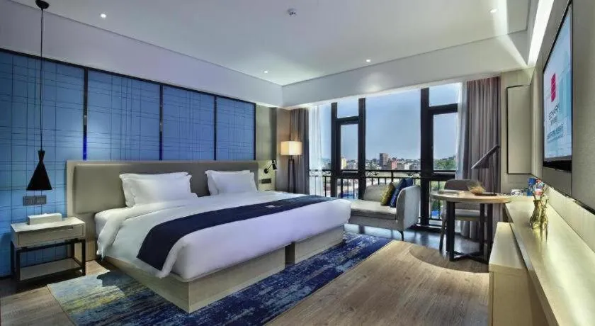 Bed in Echarm Hotel Guilin North High Speed Railway Station