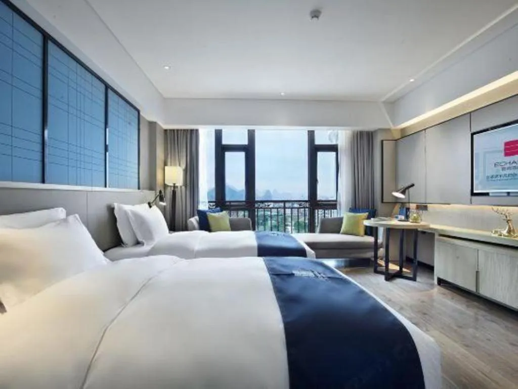 Bed in Echarm Hotel Guilin North High Speed Railway Station