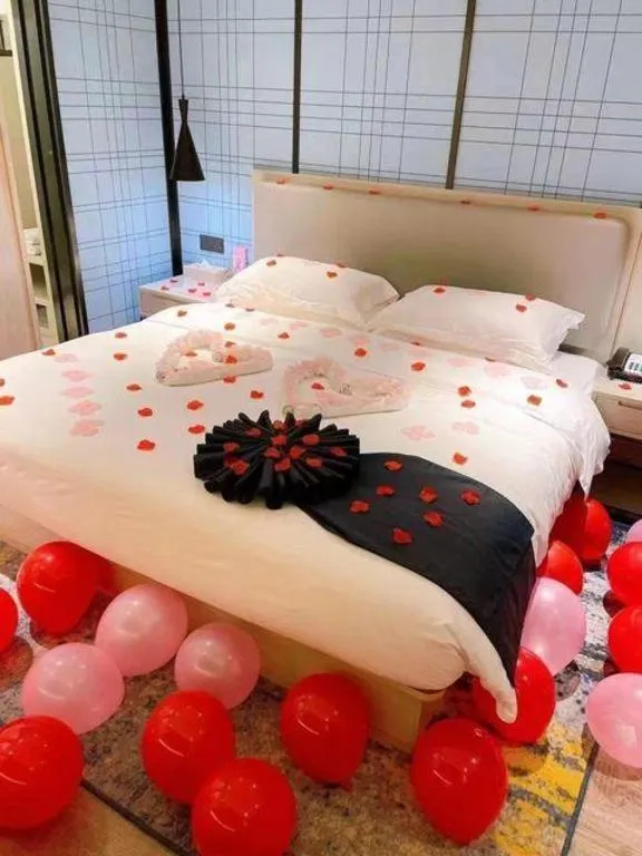 Bed in Echarm Hotel Guilin North High Speed Railway Station