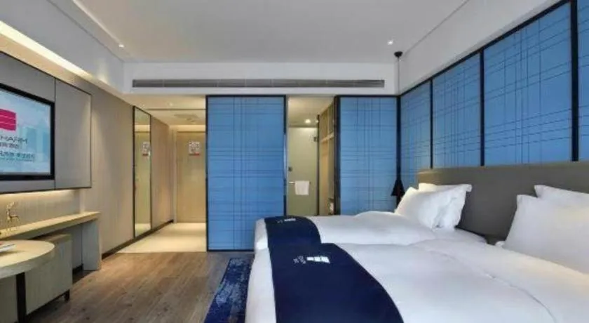 Bed in Echarm Hotel Guilin North High Speed Railway Station