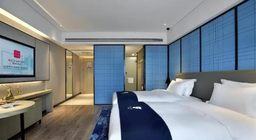 Bed in Echarm Hotel Guilin North High Speed Railway Station