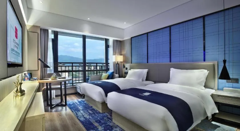 Bed in Echarm Hotel Guilin North High Speed Railway Station