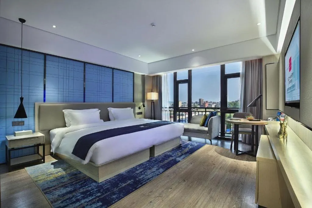 Bed in Echarm Hotel Guilin North High Speed Railway Station