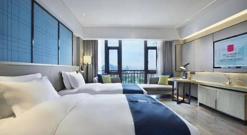 Bed in Echarm Hotel Guilin North High Speed Railway Station