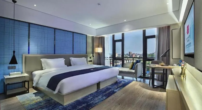 Bed in Echarm Hotel Guilin North High Speed Railway Station