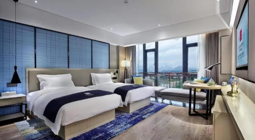 Bed in Echarm Hotel Guilin North High Speed Railway Station