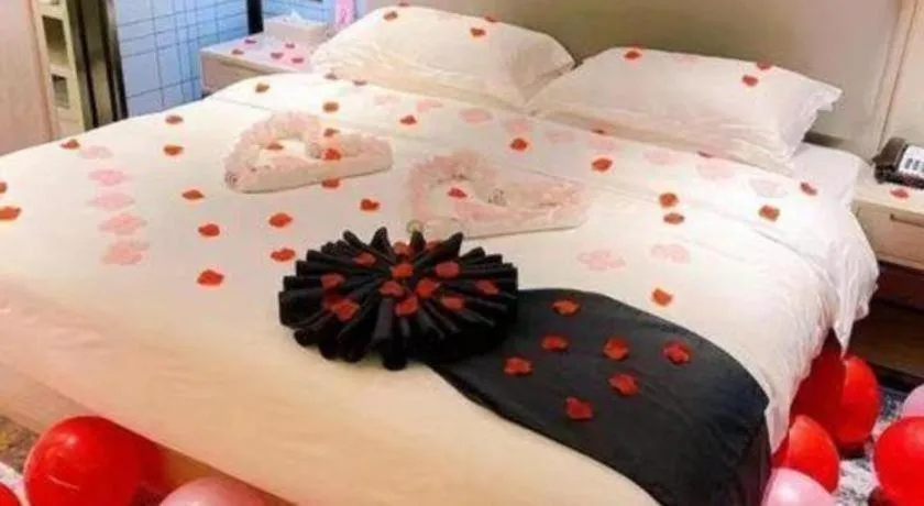 Bed in Echarm Hotel Guilin North High Speed Railway Station