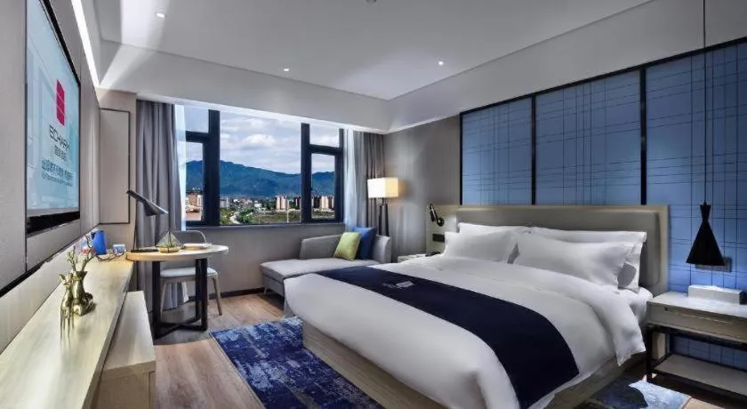 Bed in Echarm Hotel Guilin North High Speed Railway Station