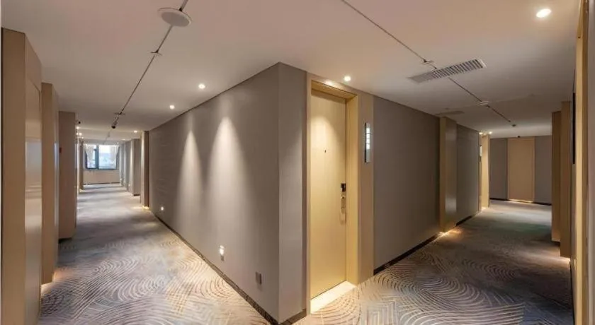 Bed in Echarm Hotel Guilin North High Speed Railway Station