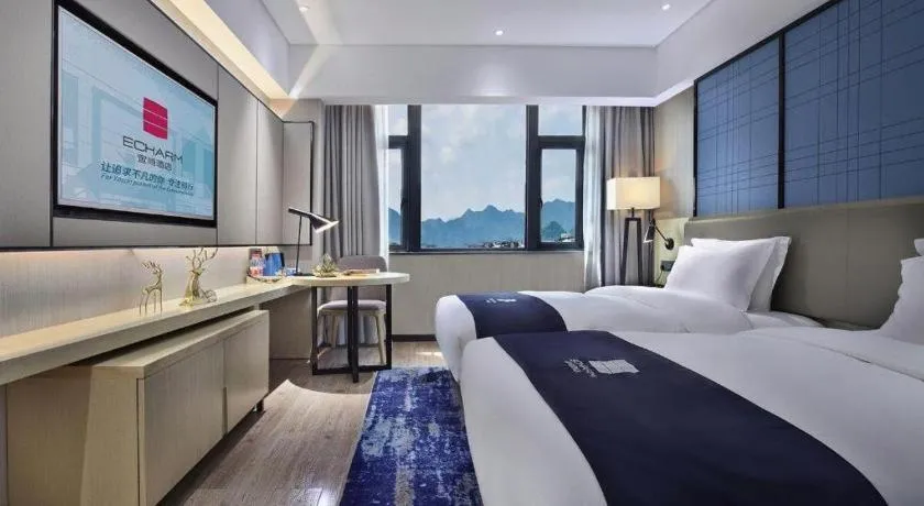 Bed in Echarm Hotel Guilin North High Speed Railway Station