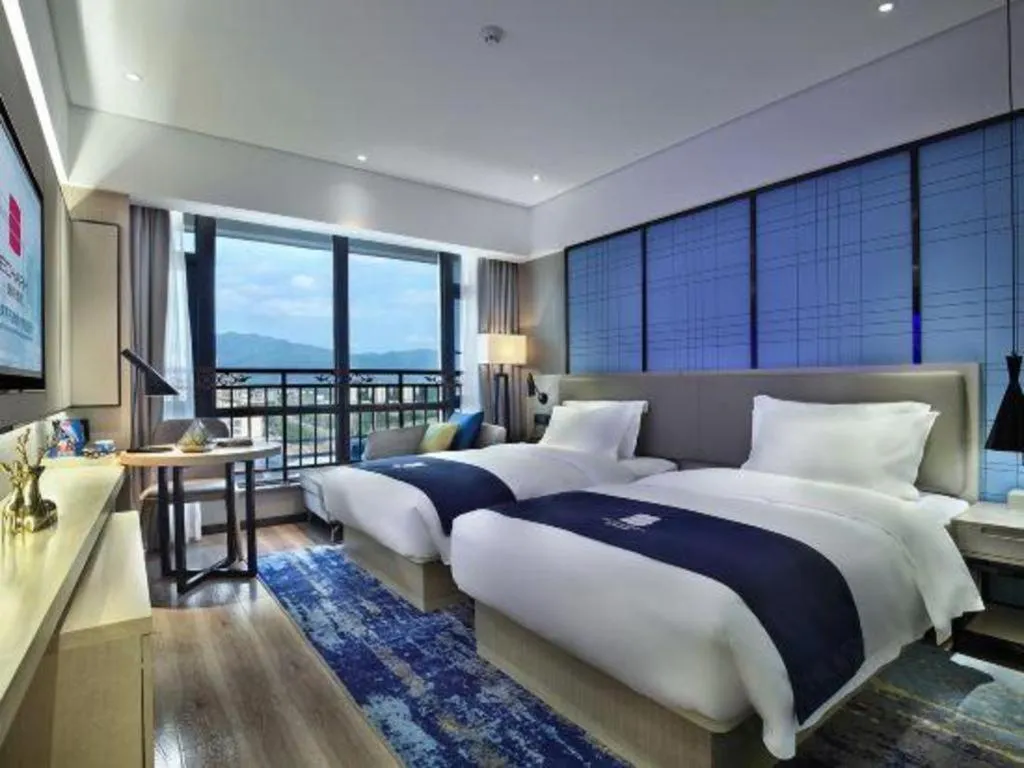 Bed in Echarm Hotel Guilin North High Speed Railway Station
